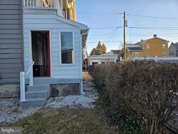 a view of a house with a small porch