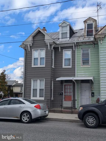 a car parked in front of a building