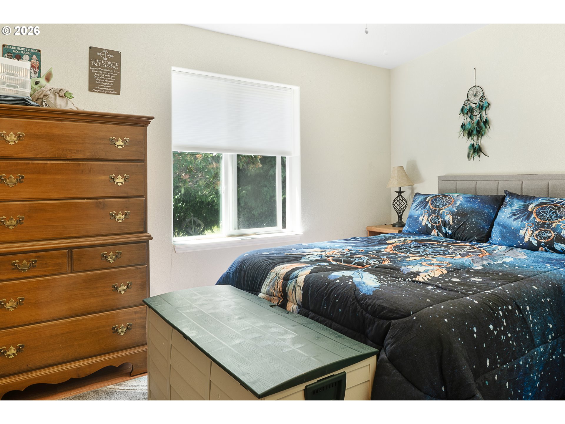 96465 Coverdell Road, Unit 8 Brookings, OR 97415 - Photo 6 of 16 a bedroom with a bed and a dresser