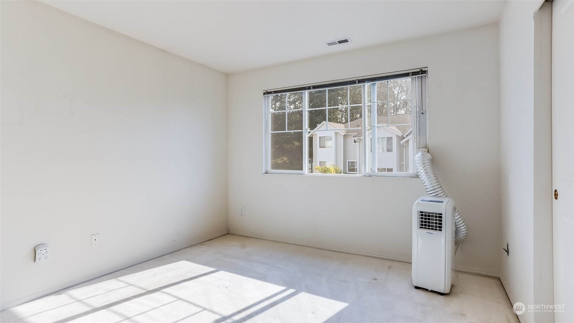 2300 Benson Road South, Unit G1 Renton, WA 98055 - Photo 19 of 36 an empty room with windows