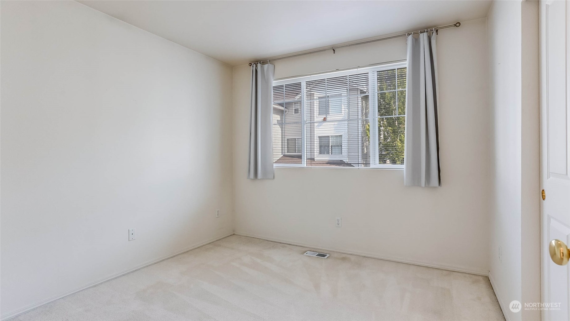 2300 Benson Road South, Unit G1 Renton, WA 98055 - Photo 20 of 36 an empty room with a window