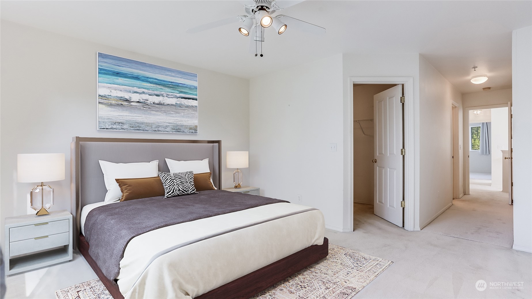2300 Benson Road South, Unit G1 Renton, WA 98055 - Photo 23 of 36 a bedroom with a large bed and a chandelier