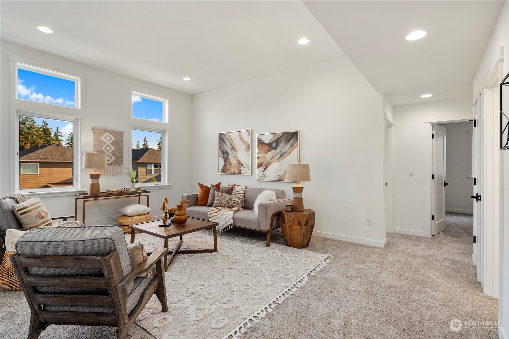 19 179th Place Southwest Bothell, WA 98012 - Photo 24 of 29 a living room with furniture and a large window