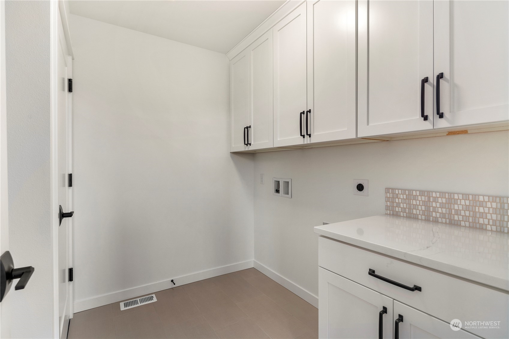 19 179th Place Southwest Bothell, WA 98012 - Photo 25 of 29 a view of cabinets and utility room with closet