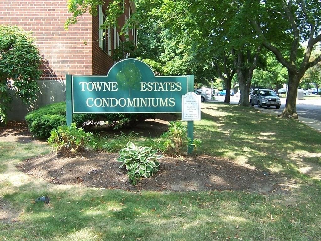 211 Lake Shore Road, Unit 2 Boston, MA 02135 - Photo 8 of 15 a sign of golf club on a tree