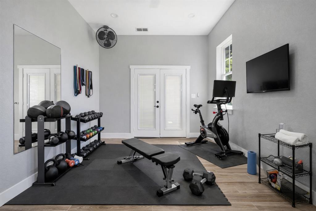 5480 New Hope Road Aubrey, TX 76227 - Photo 35 of 39 a view of a room with gym equipment