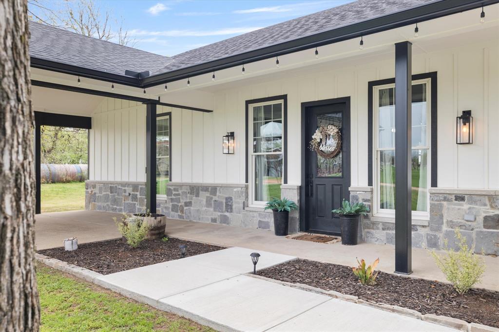 5480 New Hope Road Aubrey, TX 76227 - Photo 4 of 39 a view of living room and porch