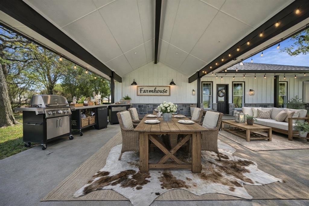 5480 New Hope Road Aubrey, TX 76227 - Photo 5 of 39 a view of a dining room with furniture