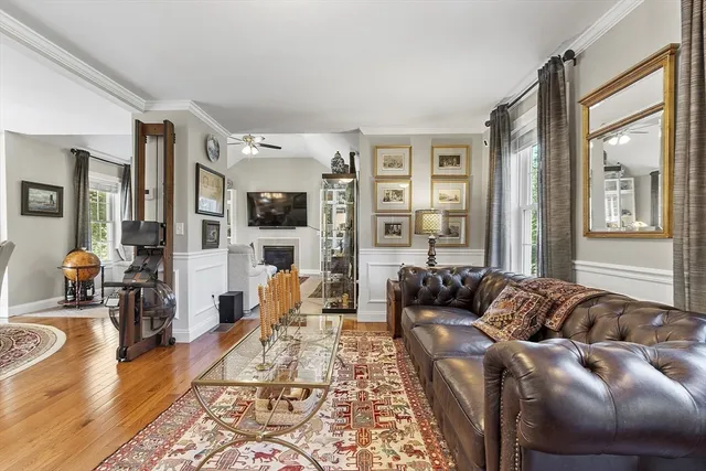 a living room with furniture large window and couch