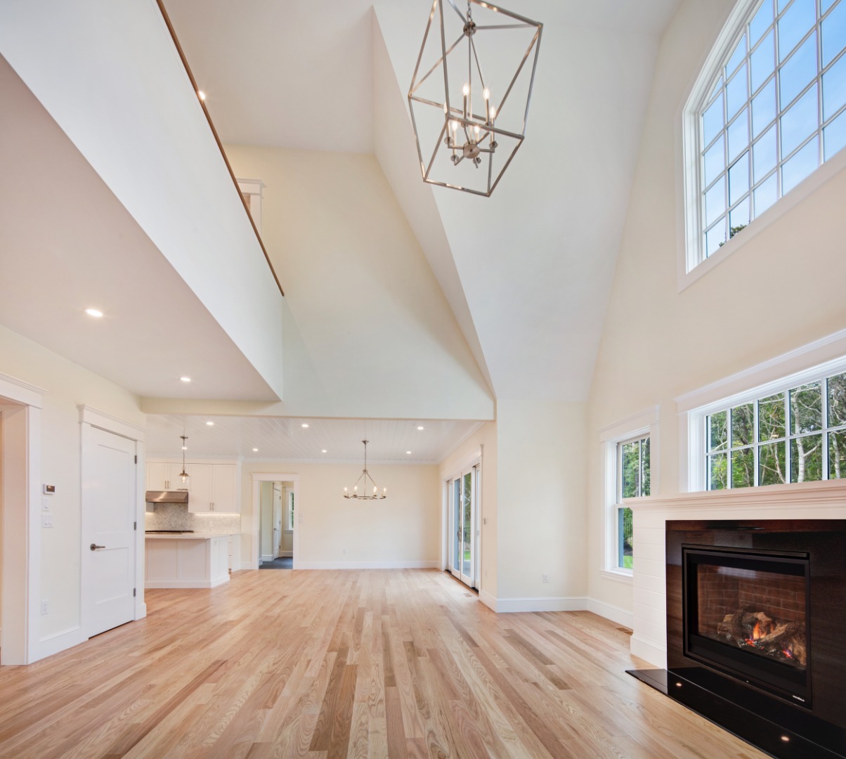 1 Wilsons Lane Edgartown, MA 02539 - Photo 13 of 18 a view of empty room with wooden floor and fireplace