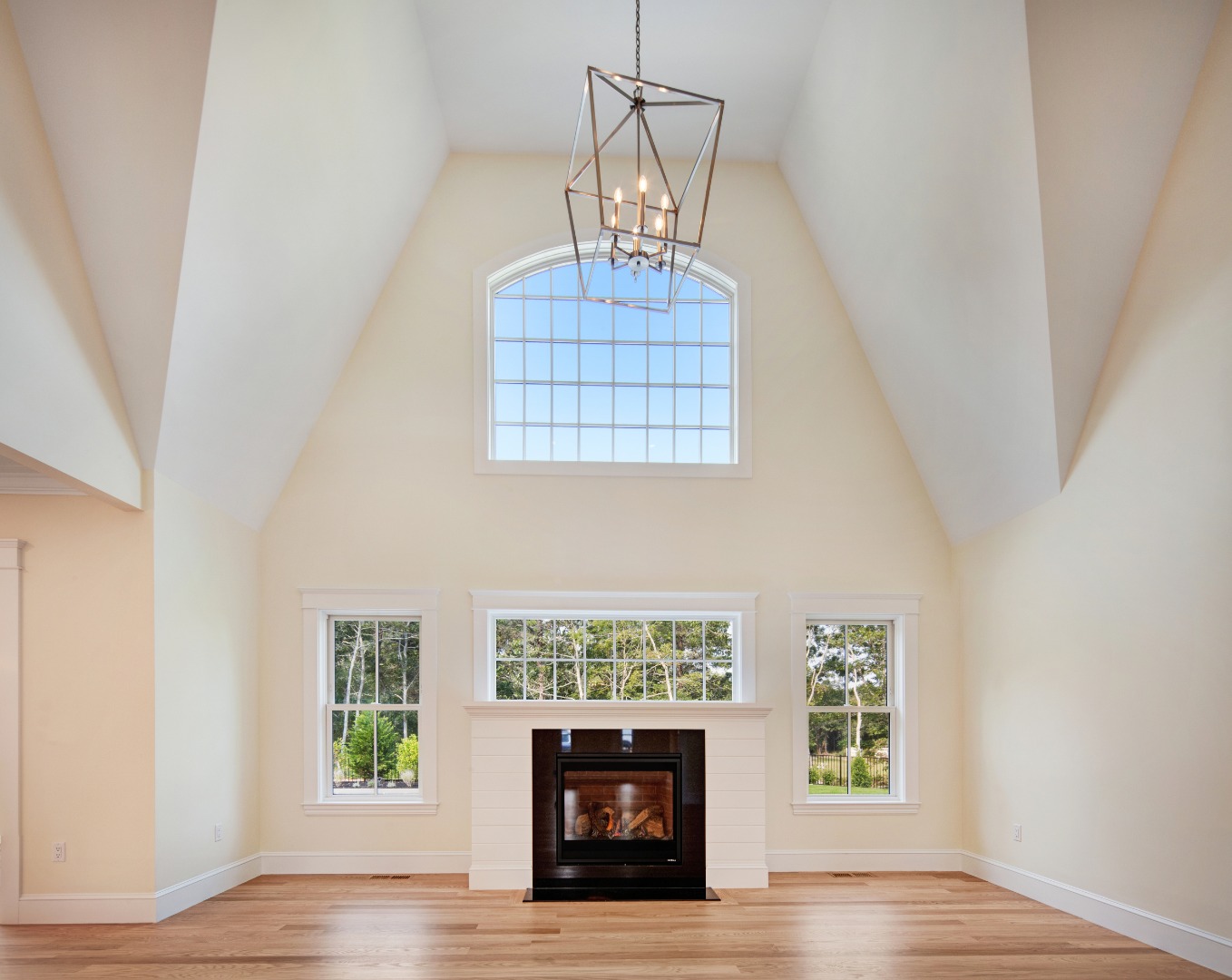 1 Wilsons Lane Edgartown, MA 02539 - Photo 14 of 18 a view of fireplace with window and wooden floor