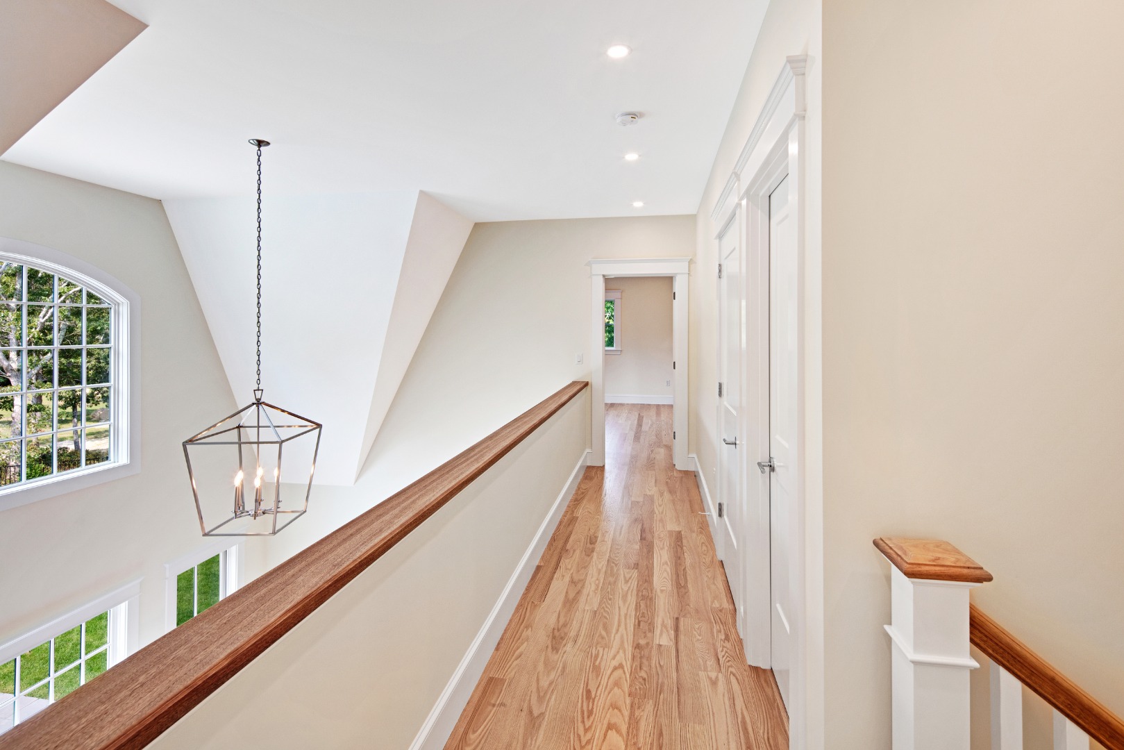 1 Wilsons Lane Edgartown, MA 02539 - Photo 16 of 18 a view of hallway with stairs and wooden floor