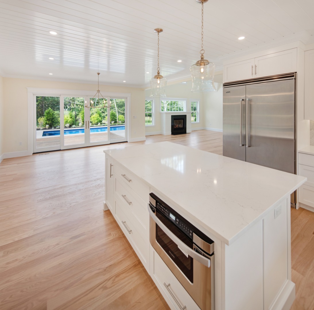 1 Wilsons Lane Edgartown, MA 02539 - Photo 10 of 18 a large kitchen with stainless steel appliances a large counter top a stove and a wooden floors
