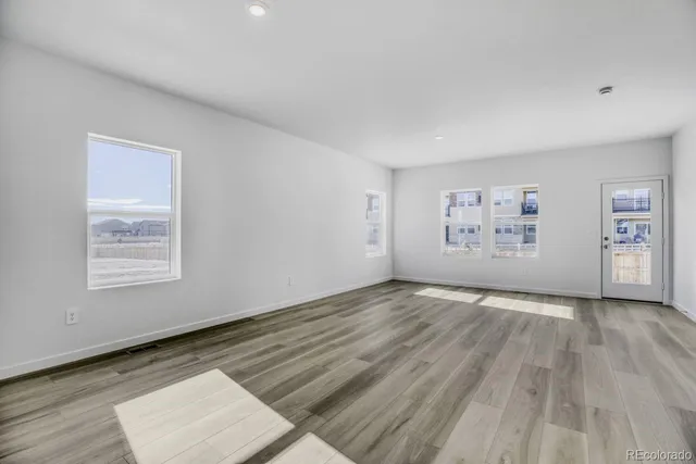 a view of a swimming pool with a yard