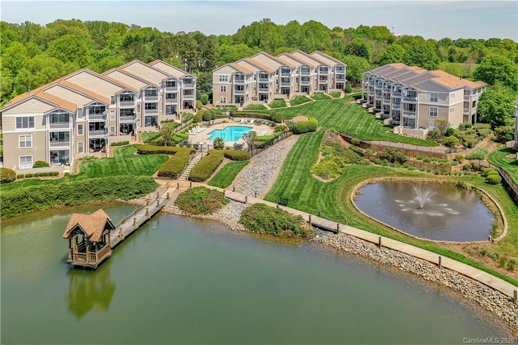 1114 Torrence Circle, Unit 1114 Davidson, NC 28036 - Photo 28 of 29 an aerial view of residential houses with outdoor space and river