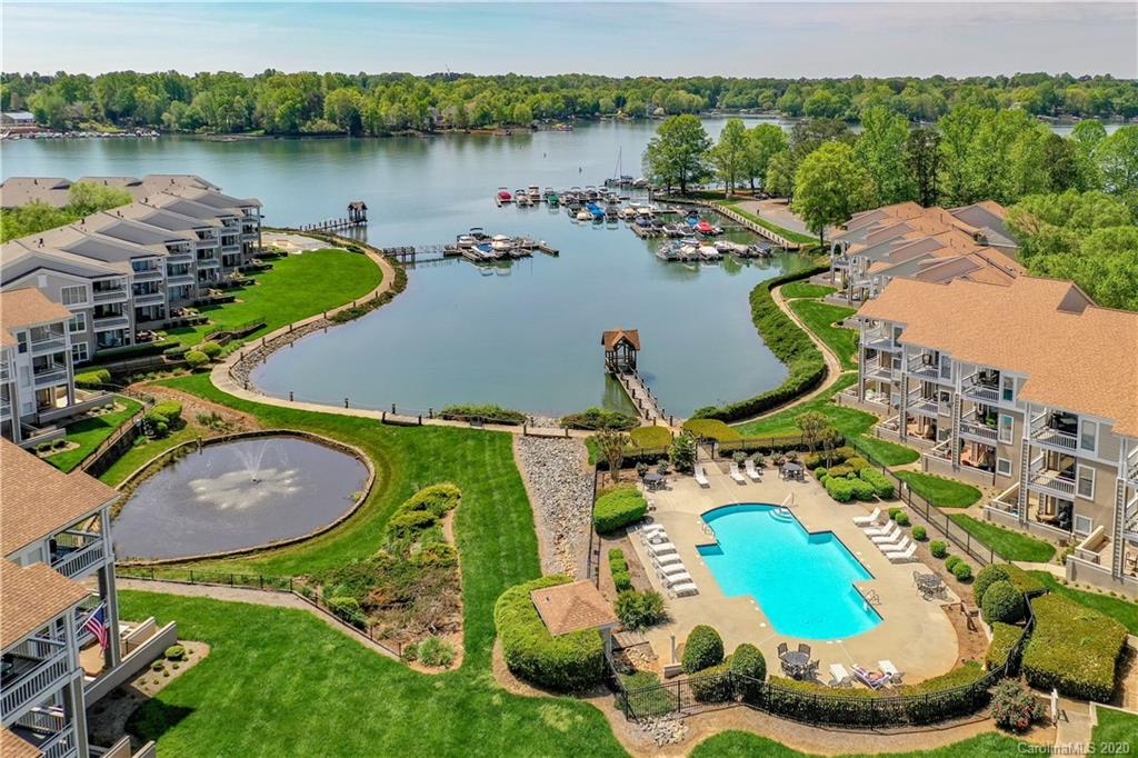 1114 Torrence Circle, Unit 1114 Davidson, NC 28036 - Photo 29 of 29 an aerial view of a house with outdoor space and a lake view