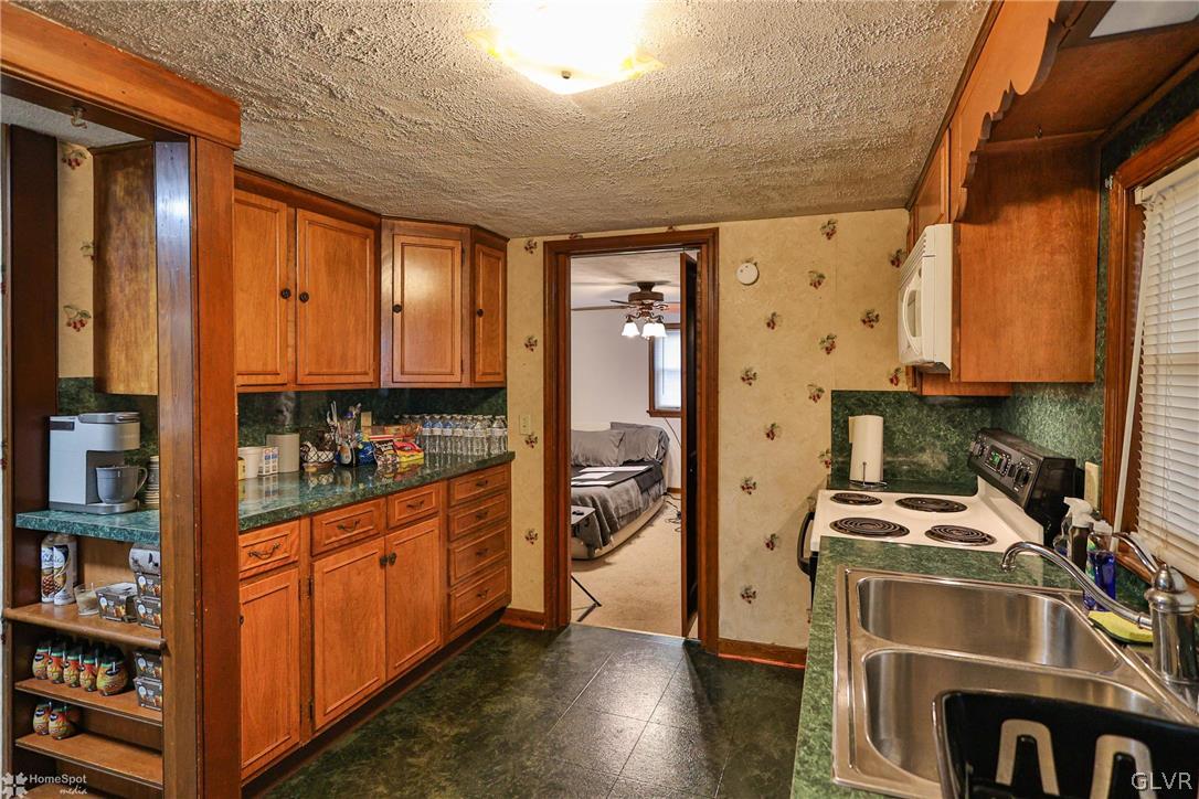 292 East Moorestown Road Wind Gap, PA 18091 - Photo 12 of 46 a room with furniture a rug and a window