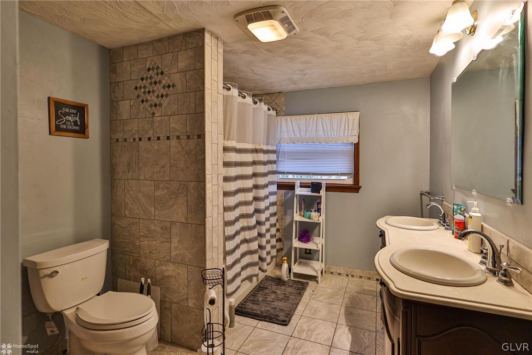 292 East Moorestown Road Wind Gap, PA 18091 - Photo 24 of 46 a bathroom with a sink toilet and shower