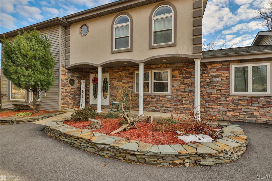 292 East Moorestown Road Wind Gap, PA 18091 - Photo 3 of 46 a front view of a house with a yard