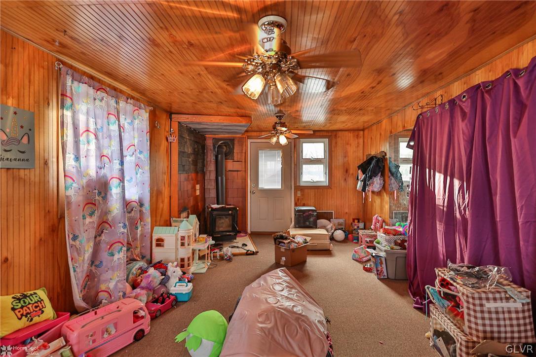 292 East Moorestown Road Wind Gap, PA 18091 - Photo 31 of 46 a bedroom with furniture and a chandelier