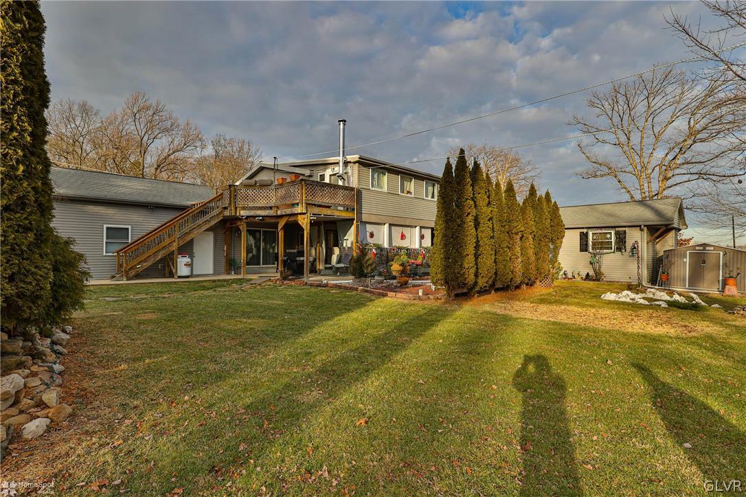 292 East Moorestown Road Wind Gap, PA 18091 - Photo 42 of 46 a front view of a house with a yard and garage