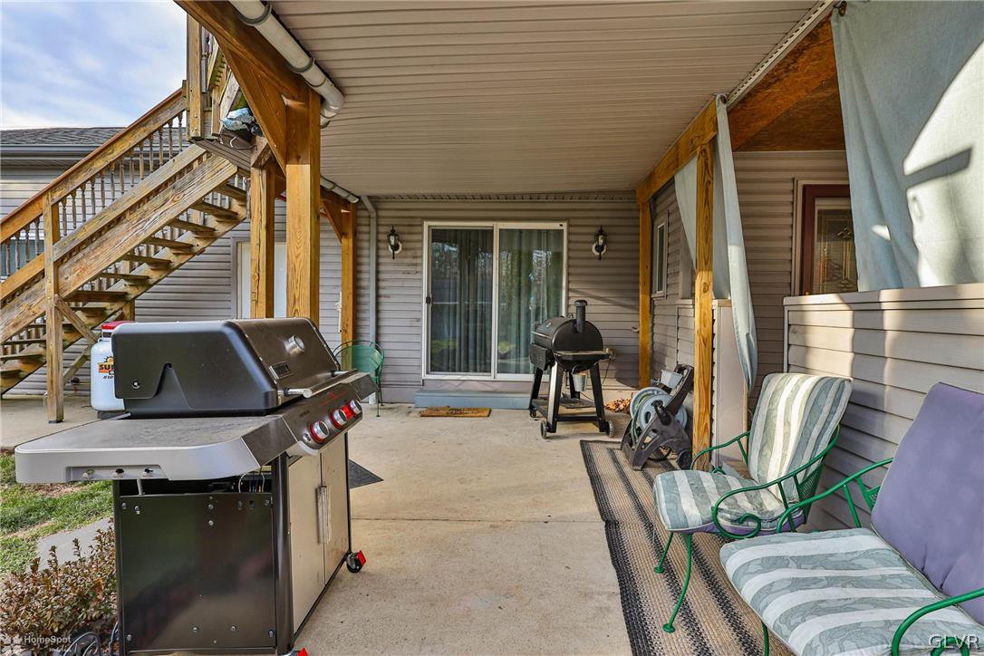 292 East Moorestown Road Wind Gap, PA 18091 - Photo 45 of 46 a view of a house with backyard sitting area and furniture