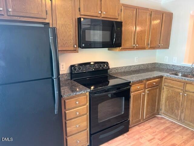 4507 Still Pines Drive Raleigh, NC 27613 - Photo 6 of 27 a kitchen with granite countertop cabinets stainless steel appliances and a counter space