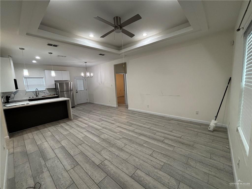 212 Lauryn Drive, Unit 3 San Juan, TX 78589 - Photo 26 of 27 a view of kitchen with refrigerator and window