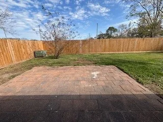 a view of backyard with green space