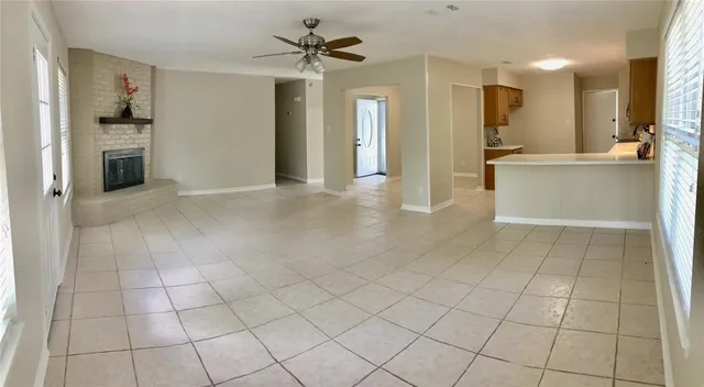 a view of an empty room and window