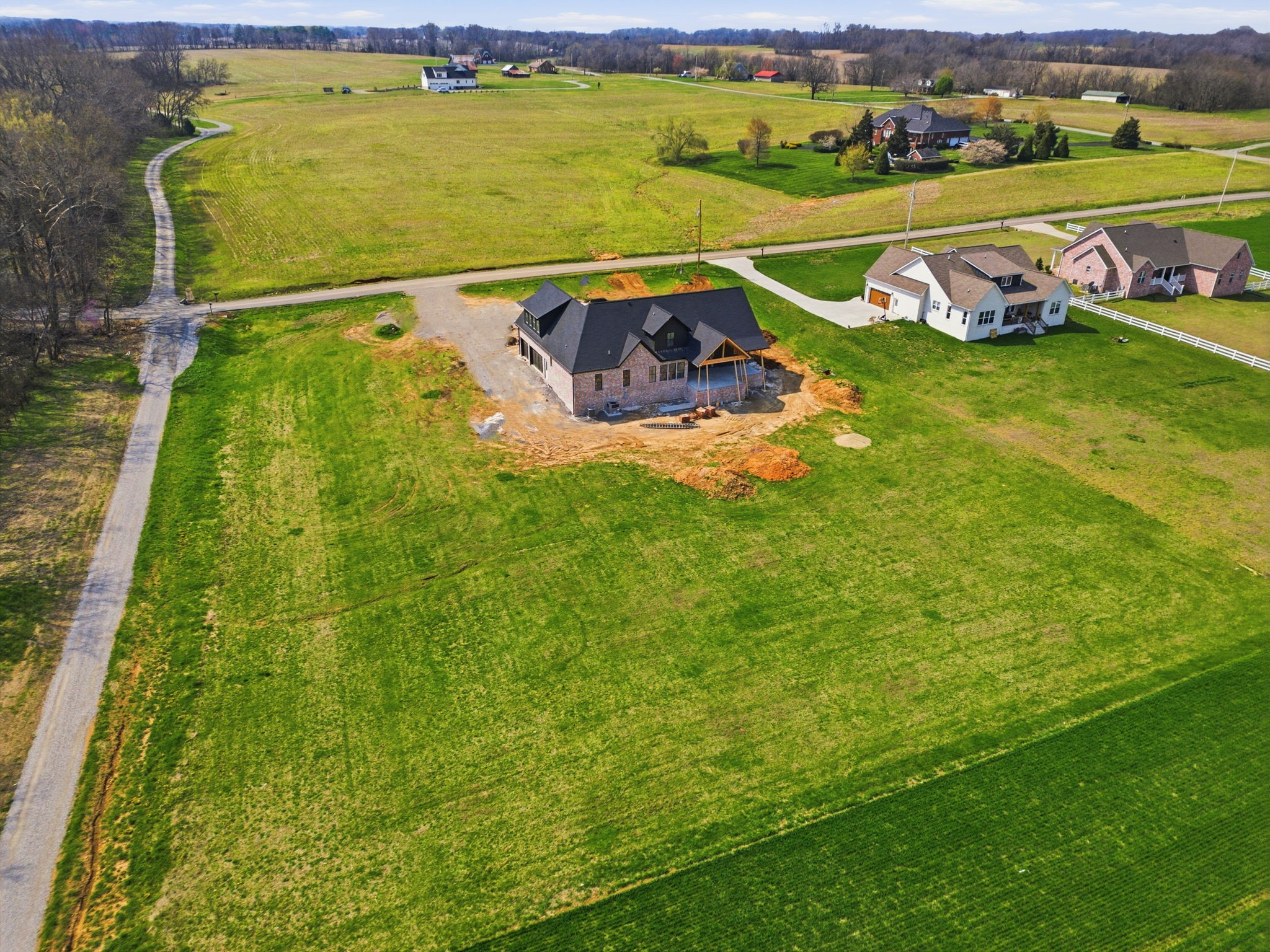 293 Aplin Branch Road Cottontown, TN 37048 - Photo 8 of 9 a view of a lake with a big yard