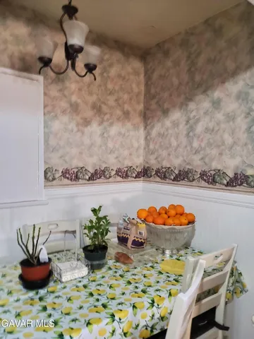 a vase of flowers sitting on a table