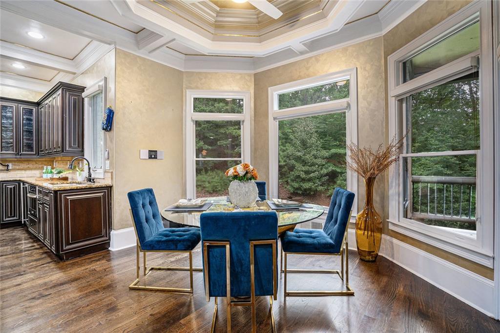4025 Cascade Road Atlanta, GA 30331 - Photo 20 of 48 a dining room with furniture and wooden floor