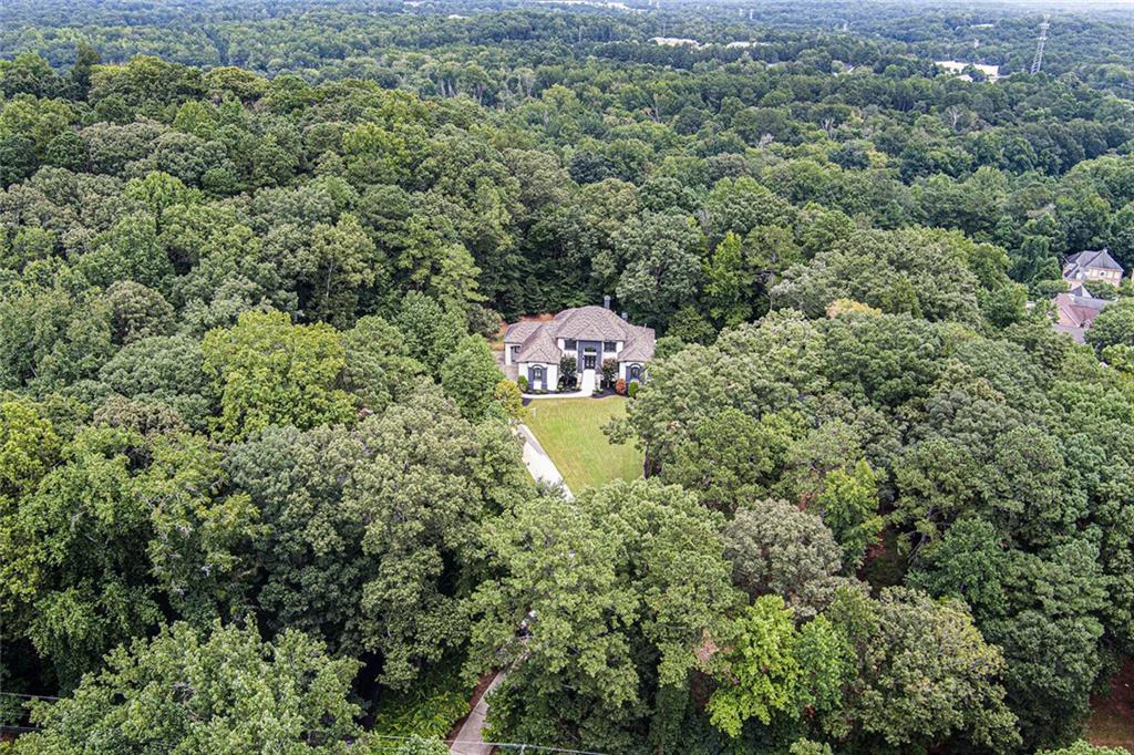 4025 Cascade Road Atlanta, GA 30331 - Photo 43 of 48 an aerial view of a house with a yard and lake view