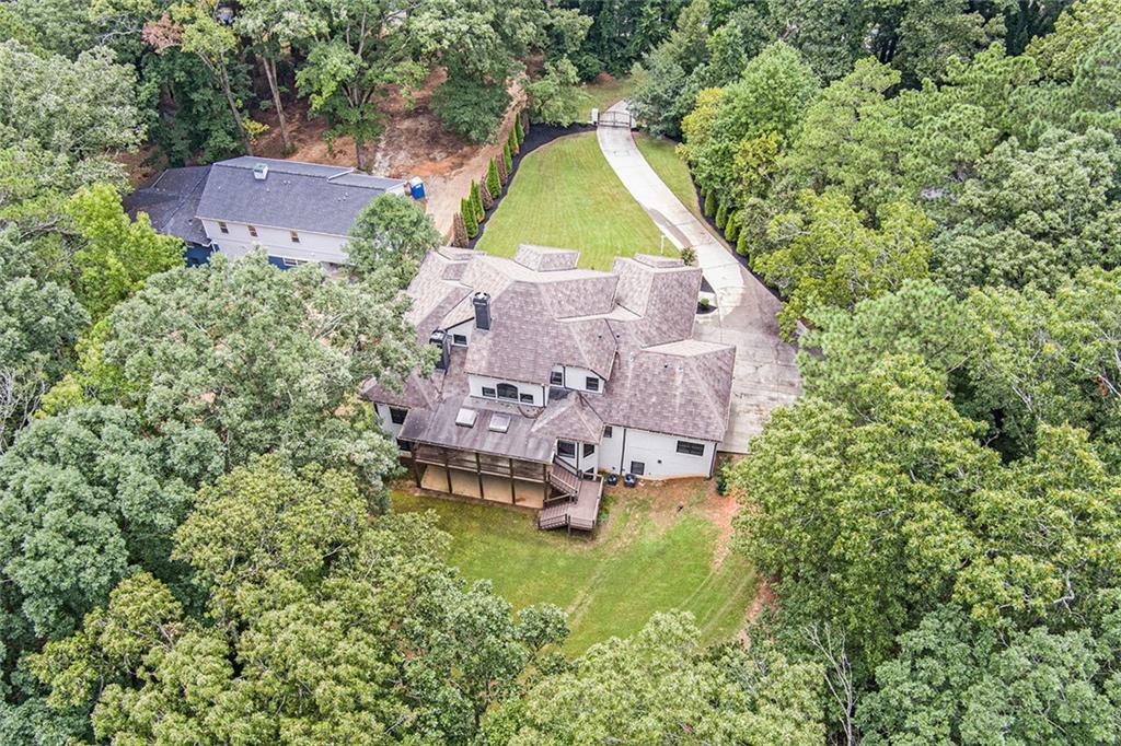 4025 Cascade Road Atlanta, GA 30331 - Photo 44 of 48 an aerial view of a house with a garden and trees