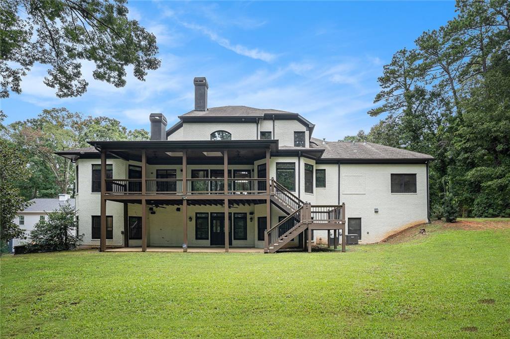 4025 Cascade Road Atlanta, GA 30331 - Photo 8 of 48 a front view of a house with a yard