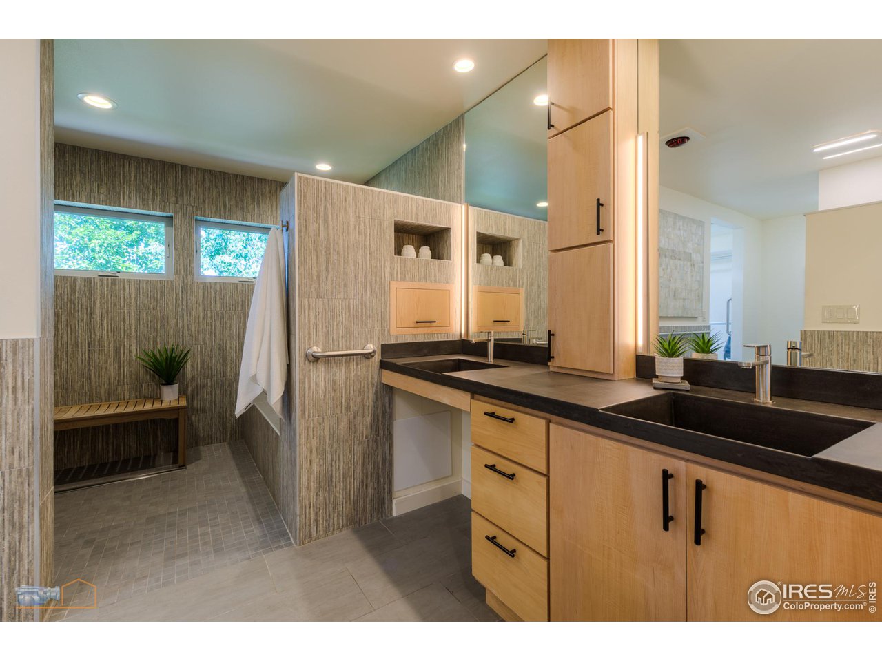 6423 Clearview Road Boulder, CO 80303 - Photo 14 of 40 a kitchen with granite countertop a sink and a refrigerator