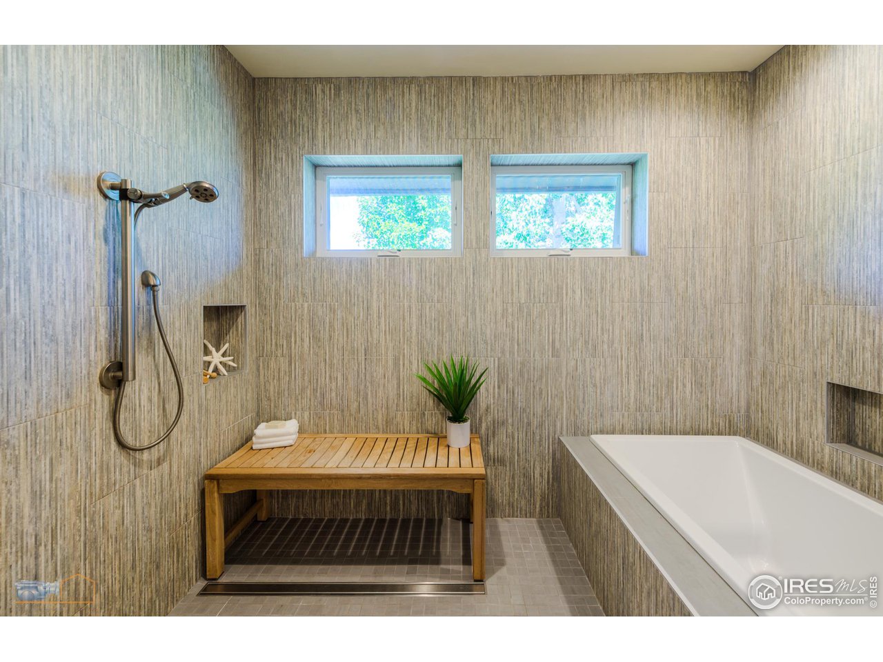 6423 Clearview Road Boulder, CO 80303 - Photo 15 of 40 a bathroom with a sink a toilet and shower