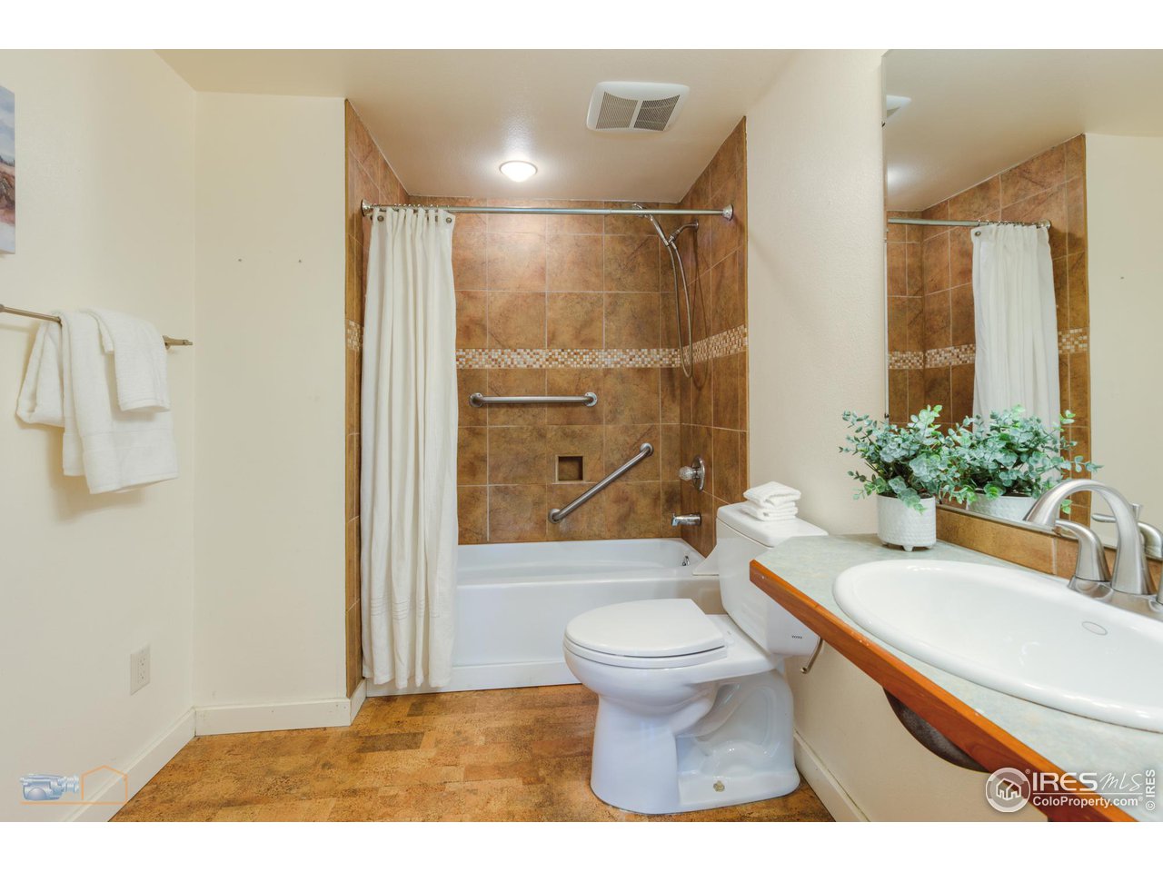 6423 Clearview Road Boulder, CO 80303 - Photo 24 of 40 a bathroom with a sink toilet and shower