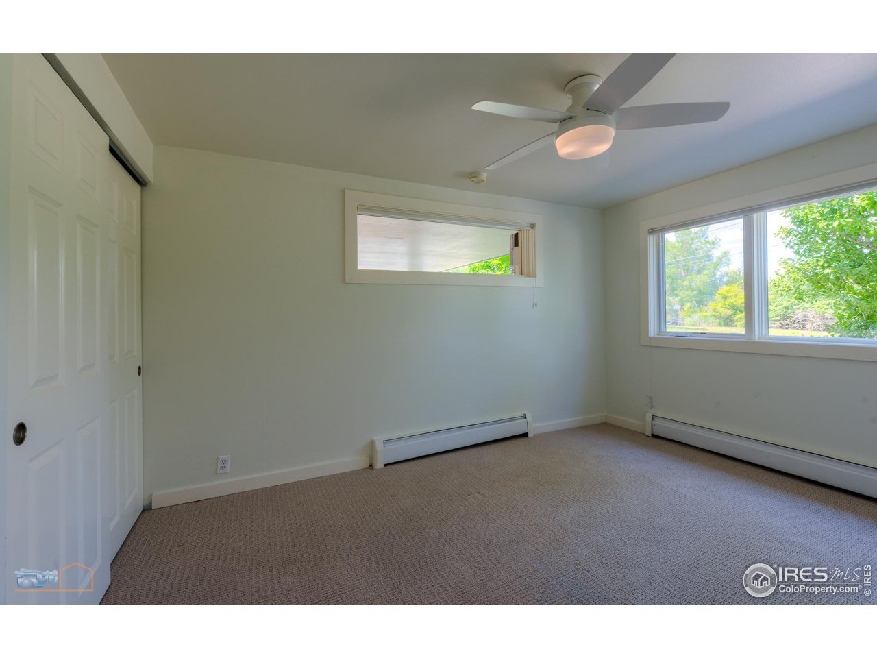 6423 Clearview Road Boulder, CO 80303 - Photo 27 of 40 a view of an empty room and window