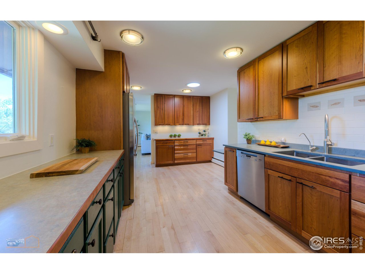 6423 Clearview Road Boulder, CO 80303 - Photo 8 of 40 a kitchen with a sink cabinets and window