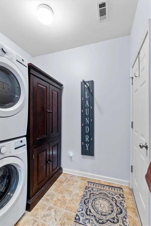 201 Providence Lane Canton, GA 30114 - Photo 9 of 50 a view of a storage & utility room with washer and dryer
