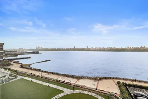 a view of a lake with a city