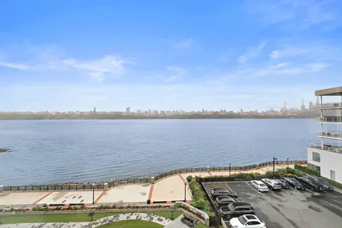 a view of a lake with a big yard