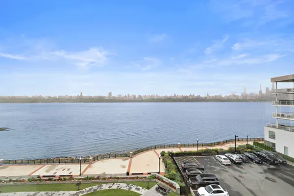 a view of a lake with a big yard