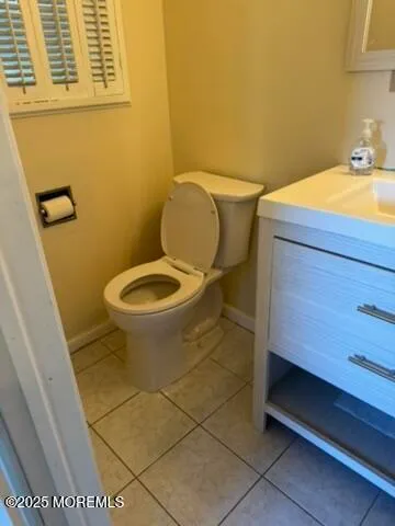 a bathroom with a toilet and a sink