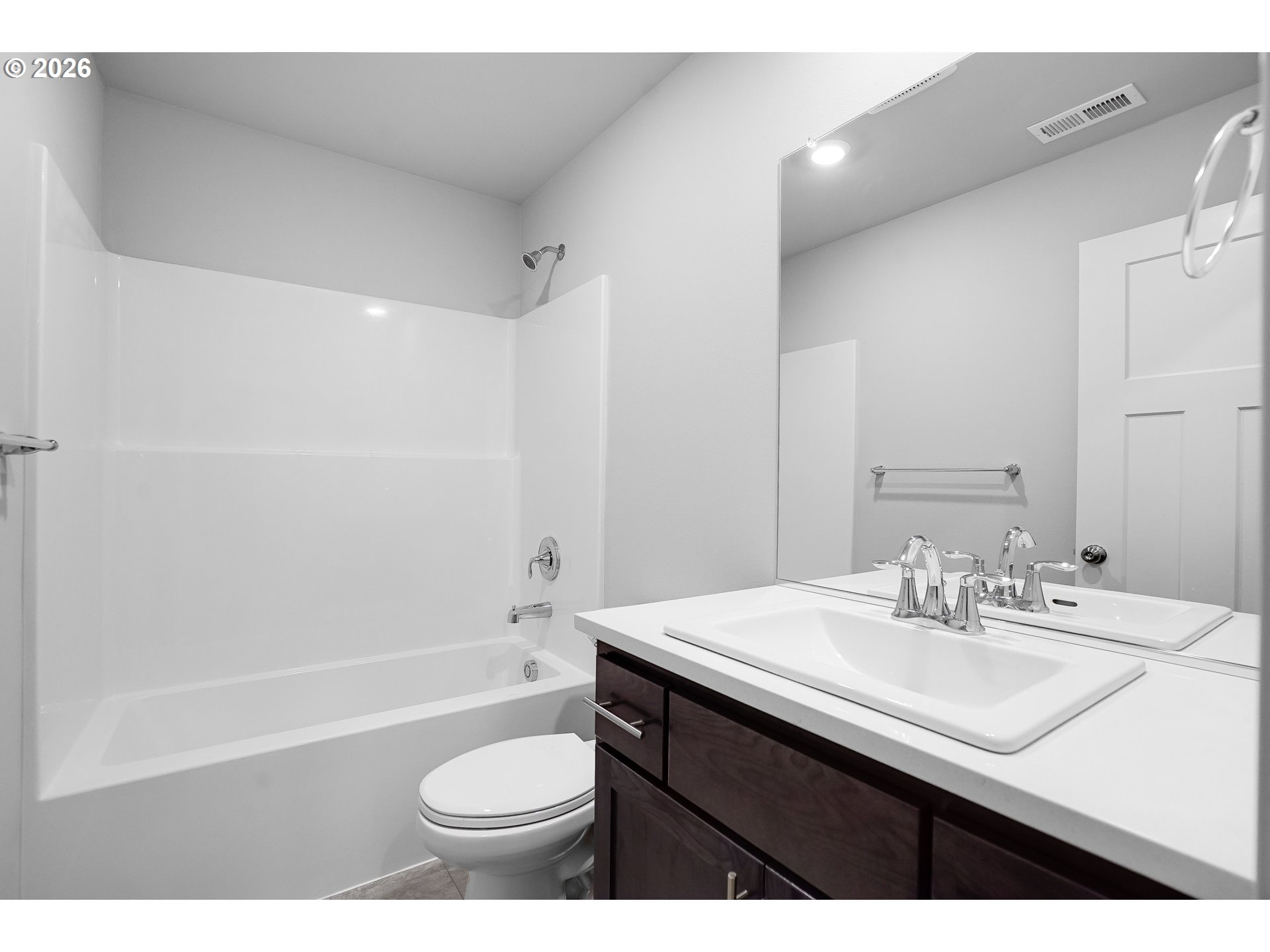 33374 Southwest Rokin Way Scappoose, OR 97056 - Photo 31 of 44 a bathroom with a sink a toilet and a bathtub