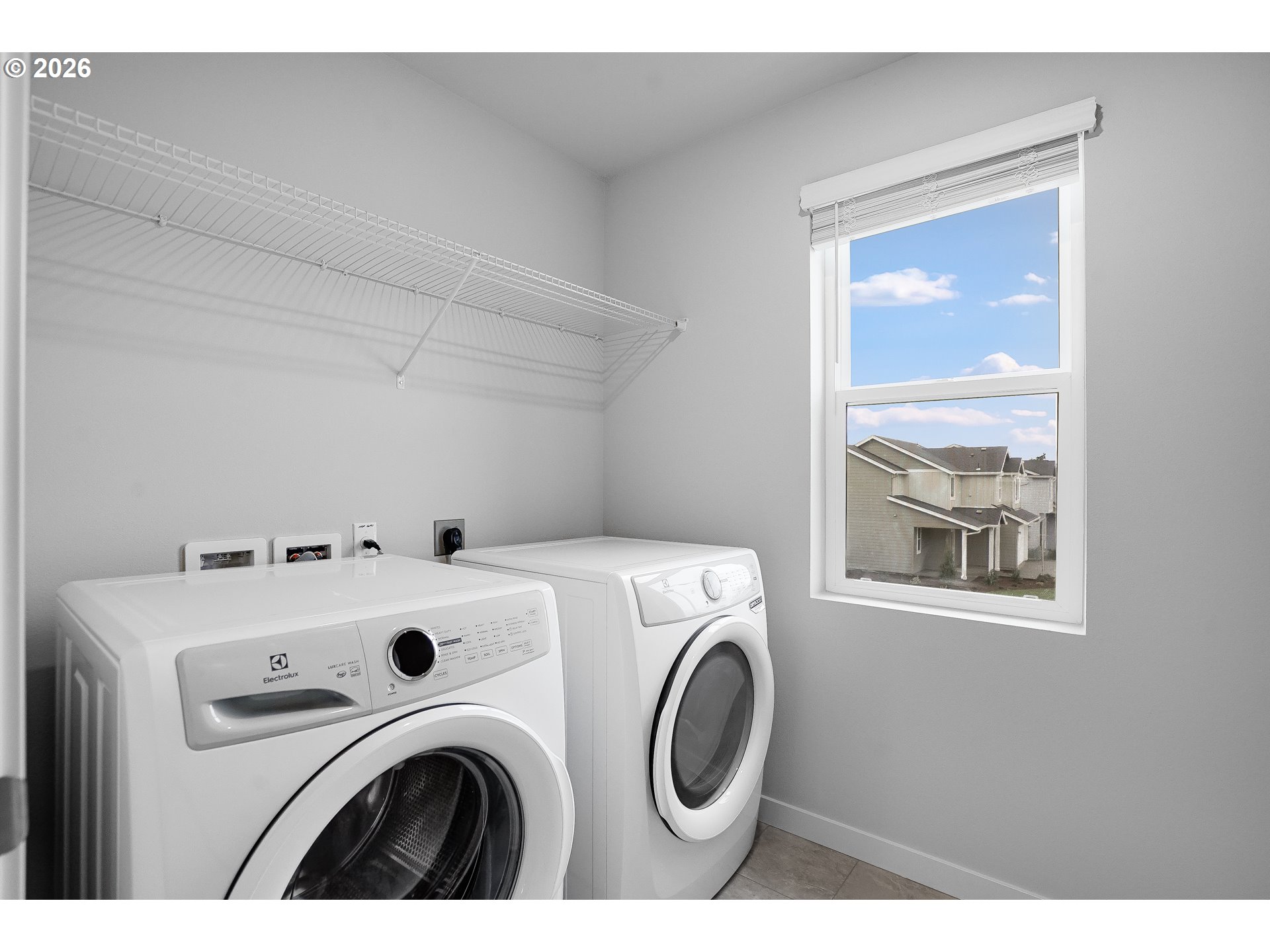 33374 Southwest Rokin Way Scappoose, OR 97056 - Photo 35 of 44 a utility room with dryer and washer