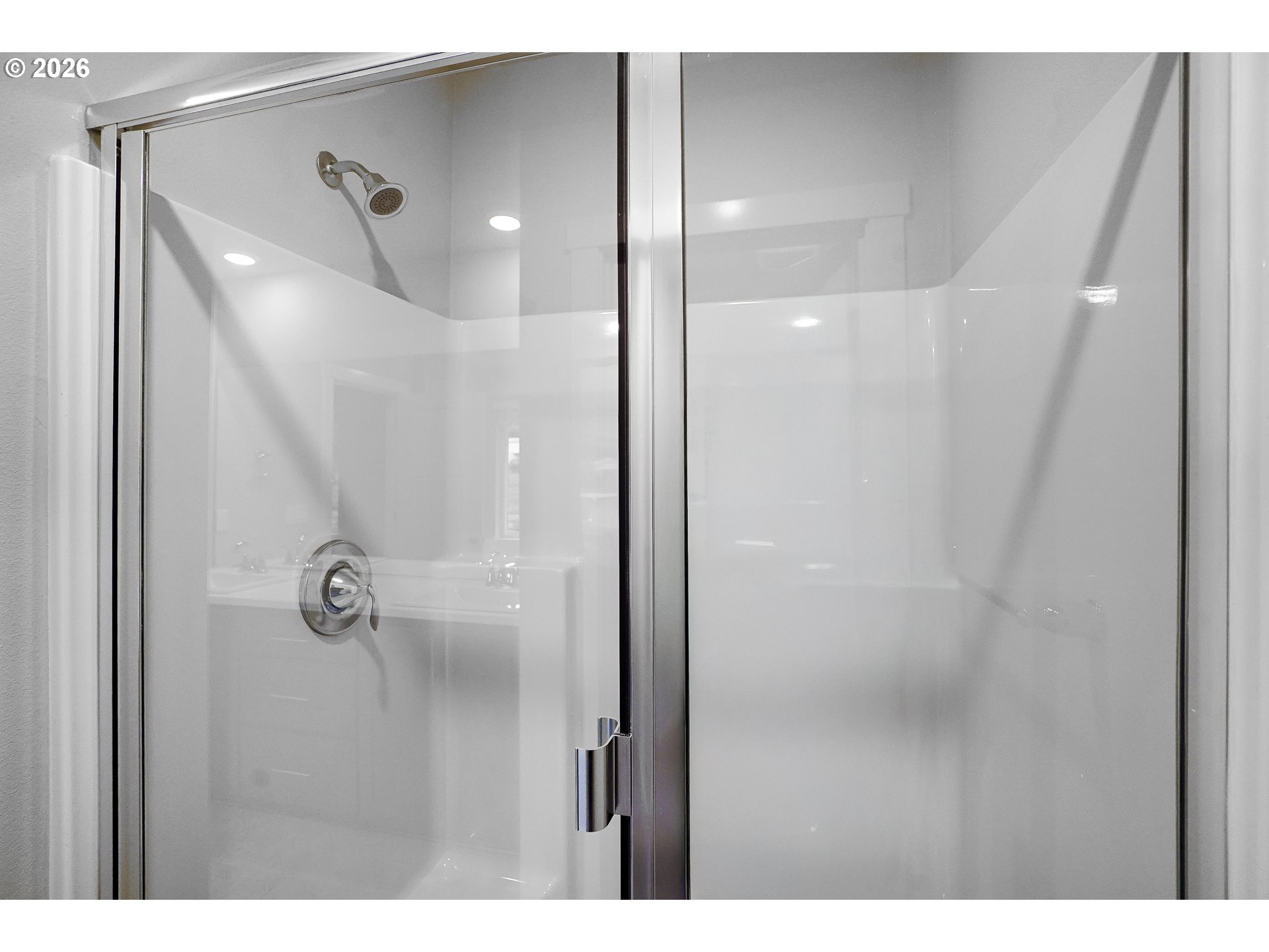 33374 Southwest Rokin Way Scappoose, OR 97056 - Photo 40 of 44 a bathroom with a glass shower door