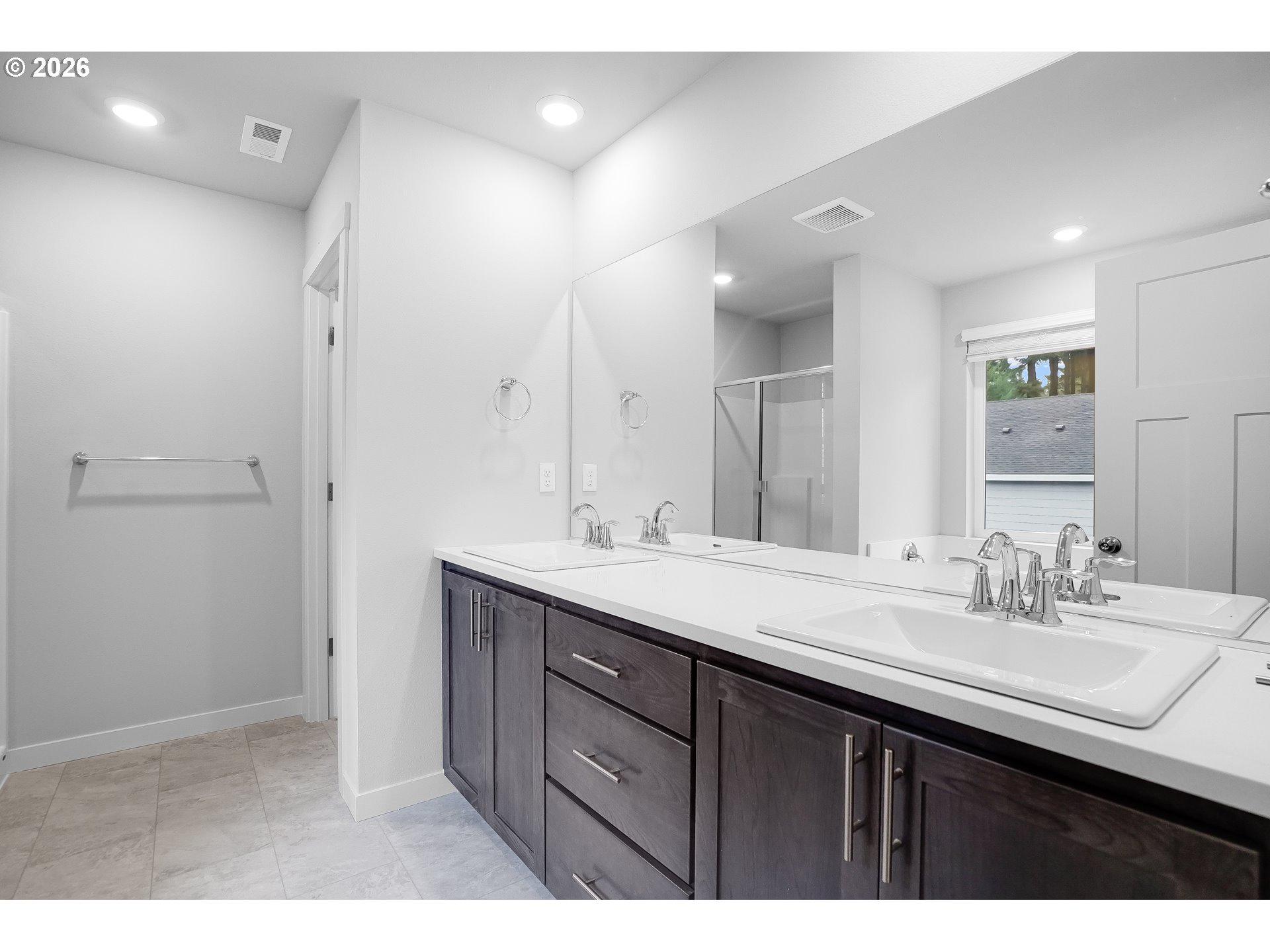 33374 Southwest Rokin Way Scappoose, OR 97056 - Photo 42 of 44 a bathroom with a sink double vanity and a mirror